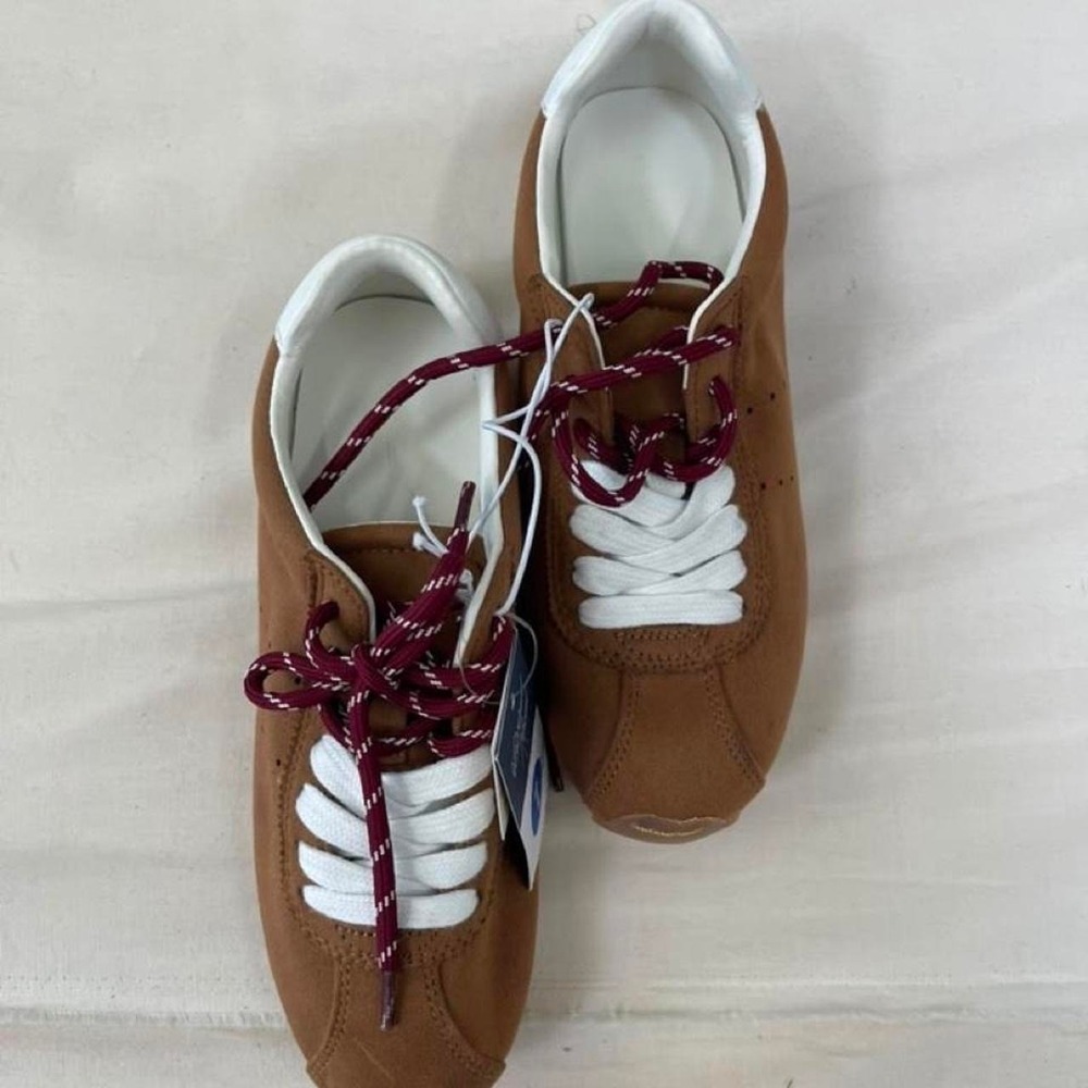 Brand new with tags, never worn. Women's size 7.5Brown suede with white laces